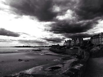 View of city against cloudy sky