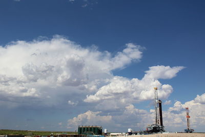 Panoramic view of factory against sky