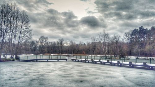 Scenic view of landscape against sky during winter