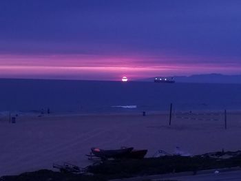 Scenic view of sea against sky at sunset