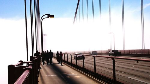 People on road at sunset