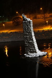 Close-up of illuminated reflection in winter at night