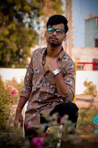 Portrait of young man wearing sunglasses