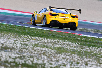 Yellow toy car on road