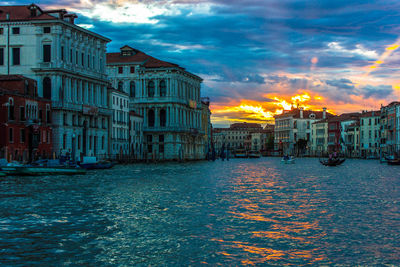 Canal passing through city buildings