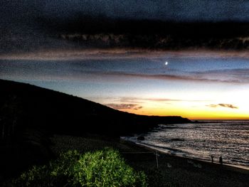 Scenic view of dramatic sky over sea