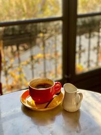 Coffee cup on table