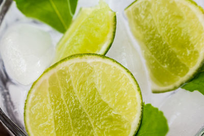 Close-up of lemon in glass