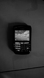 View of mobile phone against sky