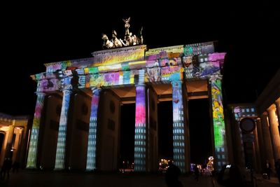 Low angle view of historical building at night