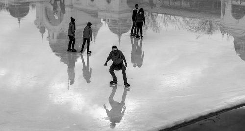 Reflection of woman in water