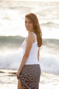 Woman standing at beach