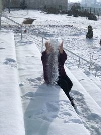 Man on snow covered land