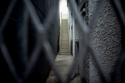 Close-up of staircase against wall