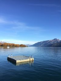 Scenic view of lake against blue sky