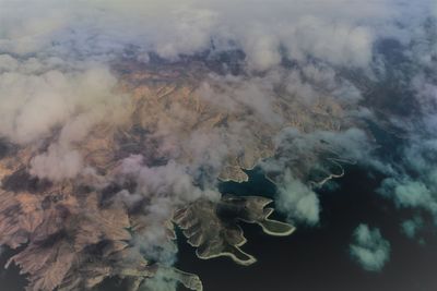 Aerial view of smoke emitting from sea-photo was taken on the plane...