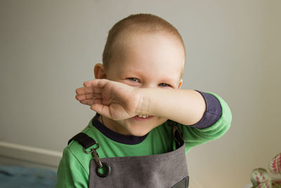 Portrait of cute boy at home