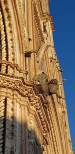 Low angle view of sculpture of building