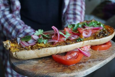 Close-up of food served on cutting board