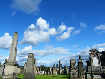 View of cemetery against cloudy sky