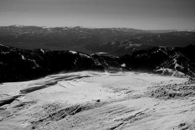 Scenic view of snow covered mountains