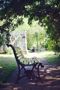 Chairs and trees in park