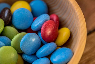 High angle view of multi colored candies on table