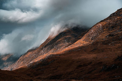 Scenic view of volcanic mountain against sky