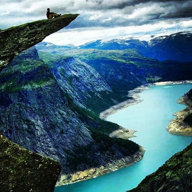 water, mountain, sky, scenics, sea, beauty in nature, tranquil scene, cloud - sky, tranquility, nature, cloud, idyllic, cloudy, tree, turquoise colored, day, rock - object, mountain range, cliff, green color