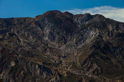 Scenic view of rocky mountains against sky