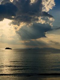 Scenic view of sea against dramatic sky