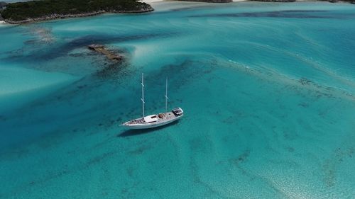 High angle view of sailboat sailing in sea