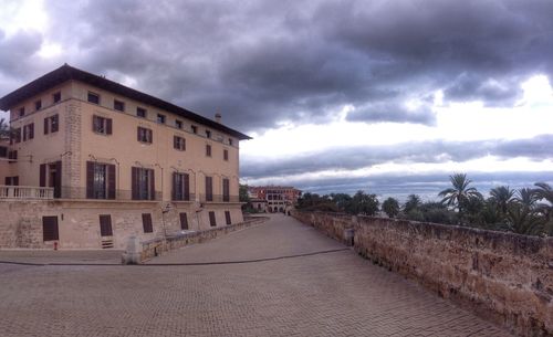 View of building against cloudy sky