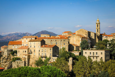 Buildings against blue sky