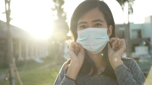 Portrait of young woman outdoors