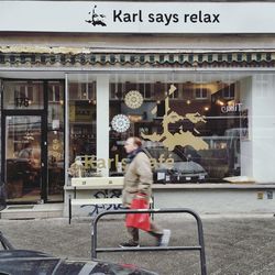 Woman in front of store