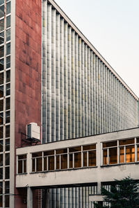 Low angle view of modern building against clear sky