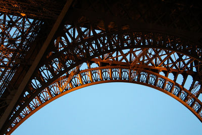 Low angle view of eiffel tower against clear sky