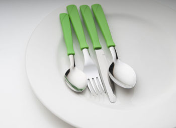 High angle view of eggs in plate on table