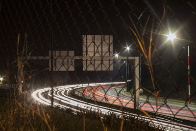 Light trails on road at night. toulouse france blagnac 