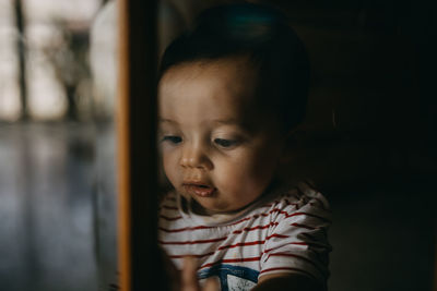 Portrait of cute boy looking away