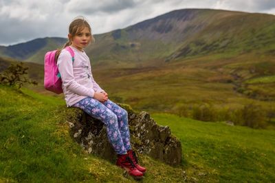 Portrait of smiling girl on landscape