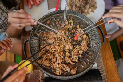 Midsection of woman preparing food