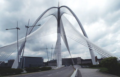 View of bridge against cloudy sky