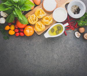 High angle view of fruits and vegetables on cutting board