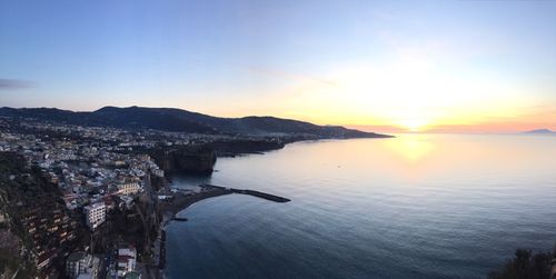 Scenic view of sea against sky at sunset