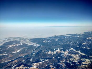 Aerial view of landscape and sea against sky