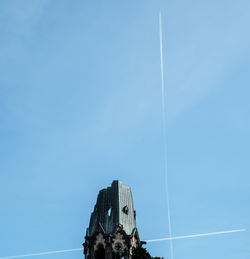 Low angle view of building against blue sky