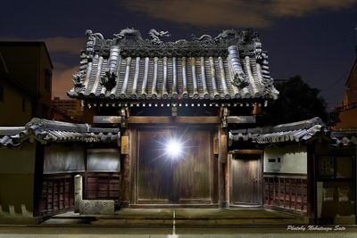 Low angle view of illuminated temple