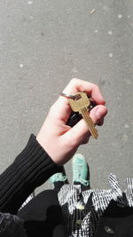 Close-up of womans hand holding key